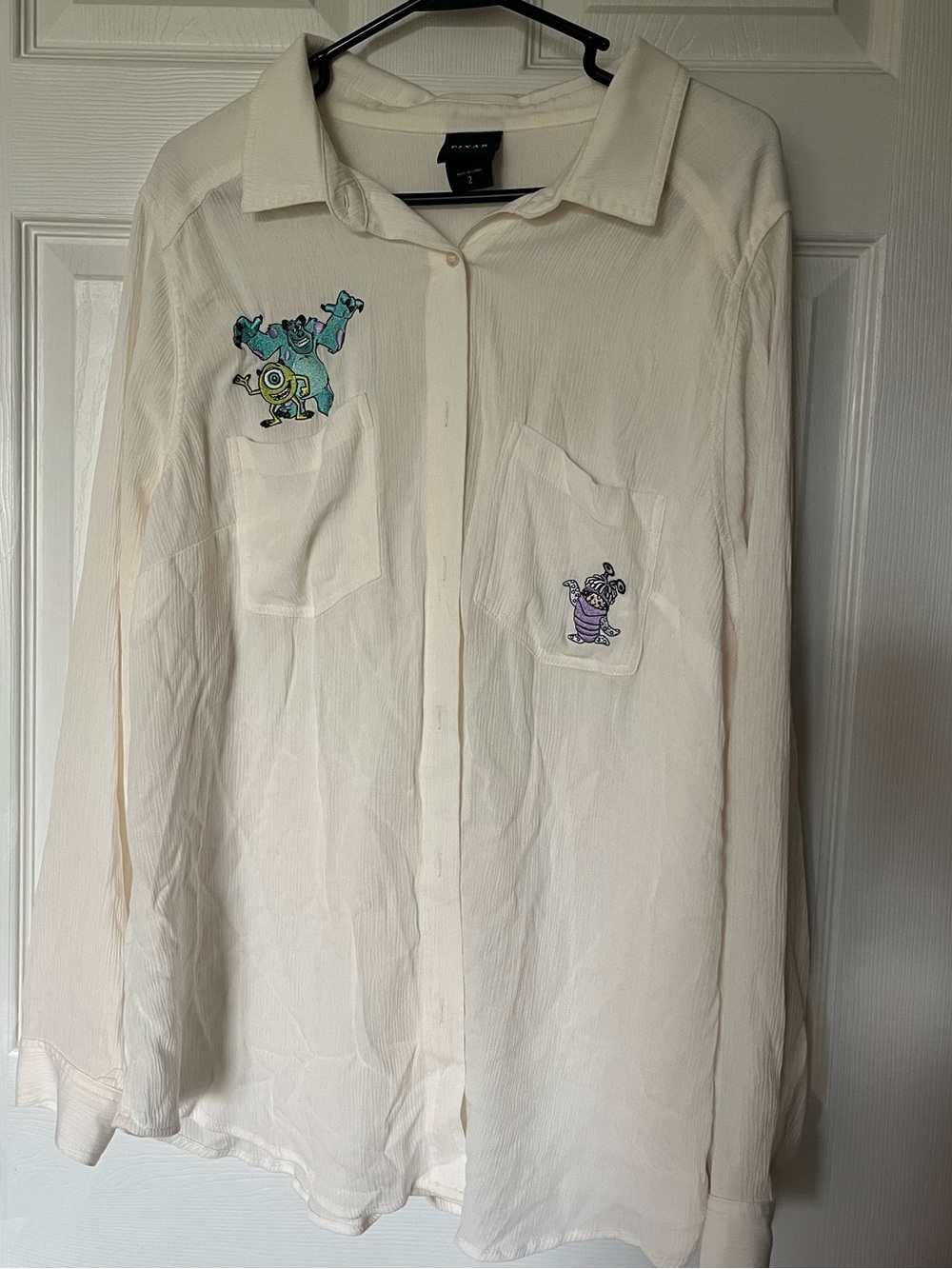 Cream Button-Up Shirt with Monster’s Inc Patches